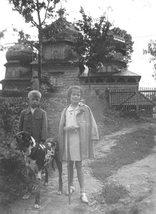 ukrchc.jpg - a nice church in the background.  oh, what a dog.